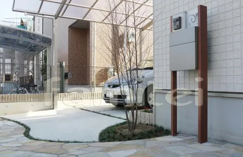 豊中市　新築オープン外構　カーポート　ピンコロ花壇　アプローチ自然石乱形貼り