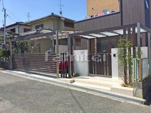 北葛城郡河合町 外構工事 新築ハイクラス クローズ外構 玄関まわり 雨除け屋根 照明 門袖 門扉 ライティング アプローチ 植栽 アーチ カーポート 跳ね上げ式門扉