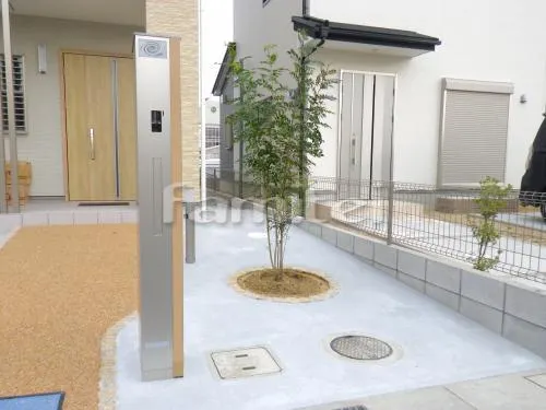 機能門柱 サークルデザイン花壇 ピンコロ石 シンボルツリー シマトネリコ 常緑樹 植栽