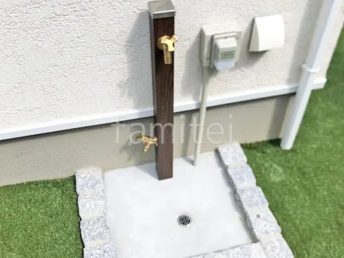 立水栓 ユニソン スプレスタンド60 蛇口2個付き ピンコロ囲い水受け(パン) 土間モルタル仕上げ 洗い場