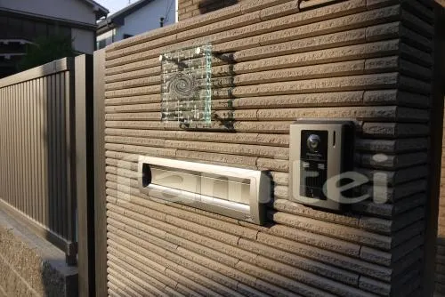 阿倍野区　角地クローズ外構　跳ね上げ門扉　タイル門扉　ベランダ屋根