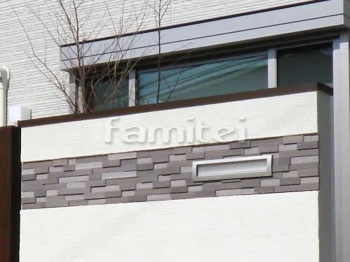 和歌山市 外構工事 玄関アプローチ モダン門柱 塗り壁 レンガ積み花壇 郵便受けポスト 木製調デザインアルミ角柱 木目調ウォール 植栽 ガーデンライト照明 玄関サークルポーチ タイルデッキ カーポート 境界フェンス塀 化粧砂利目地 塗り壁(袖壁) 木製調目隠しフェンス塀 立水栓 洗い場 雨除け屋根 鳥居柱加工