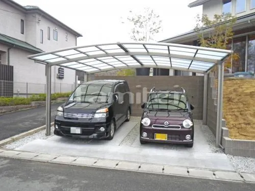 香芝市 外構工事 玄関まわり アプローチ 門柱 ポスト 袖壁 表札 植栽 自転車バイク屋根 駐輪場ガレージ床 土間コンクリート ガレージまわり 駐車場屋根 土間コンクリート 土留めブロック 目隠し化粧ブロック塀 斜面 芝生張り ガーデンルーム 