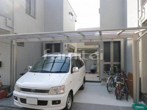 大阪市城東区 外構工事 自転車置き場 駐車場屋根 土間コンクリート 境界フェンス塀 犬走り 目隠しフェンス塀 勝手口引き戸門扉 イナバ物置