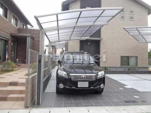 和泉市 外構工事 機能門柱 玄関アプローチ ガレージまわり 駐車場屋根 土間コンクリート 境界フェンス塀 雨除け屋根 犬走り 土間コンクリート 伸縮目地