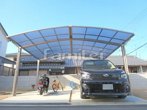 和歌山市 外構工事 アプローチ 門柱 ポスト 花壇 ガレージまわり 駐車場屋根 土間コンクリート 目隠し塀 塗り壁 木製調デザインアルミ角柱 洗濯干し屋根 犬走り 防犯砂利敷き バラス砕石 