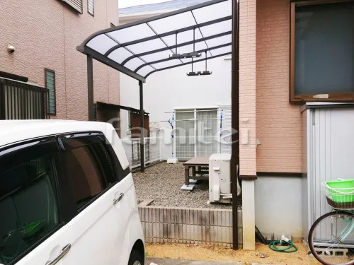 泉南郡熊取町 エクステリア工事 雨除け屋根 LIXILリクシル スピーネ 1階用 R型アール屋根 物干し