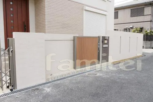 寝屋川市　クローズ外構　ウッドデッキ　アウタースライドドア　伸縮門扉　角柱