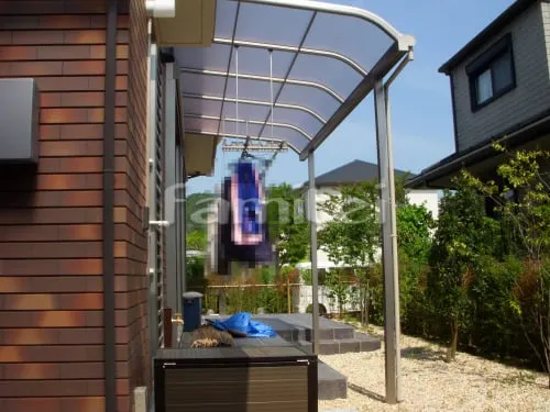 大津市 新築オープン外構　洋風門柱 レンガ貼り 立水栓 物干しテラス屋根