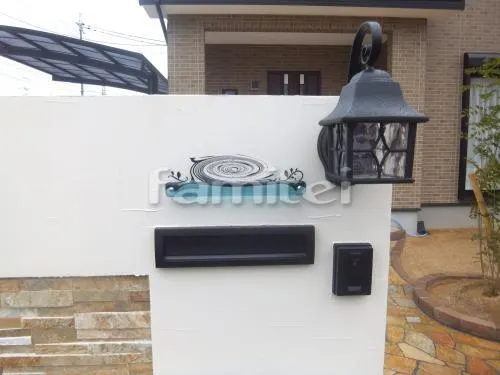 葛城市 外構工事 玄関アプローチ 乱形石貼り 玄関まわり レンガ花壇 シンボルツリー 門柱 塗り壁 石貼り ガラスブロック 門灯 表札 郵便受けポスト 目隠しフェンス塀 カーポート 駐車場ガレージ 土間コンクリート ピンロコ石 レンガ タマリュウ 目地 木製調デザイン角柱 デザイナーズパーツ 枕木材 片開き門扉 犬走り 防犯砂利