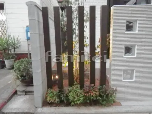 堺市西区 外構工事  モダン門柱 タイル貼り INAX はるかべくん 細割ボーダー LIXIL ガラスブロック 郵便受けポスト エクスポストS-3型 埋め込み式 口金タイプ 木製調デザインアルミ角柱 プランパーツ 角材 下草 低木 玄関ポーチ階段 床タイル貼り マルモアート 植栽 シンボルツリー ホンコンエンシス ガーデンライト照明 カーポート 洗濯干し屋根 勝手口門扉 犬走り
