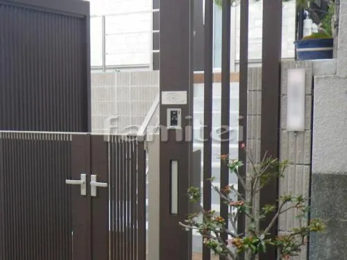 枚方市 外構工事 玄関アルミアーチ LIXILリクシル プラスG TOEXトエックス 木製調機能門柱 玄関門扉 ジオーナB2型 玄関アプローチ階段 床タイル貼り ニッタイ工業 ボルカーノ 300×600 VOL-36-20 木製調目隠しフェンス塀 細縦格子 Gスクリーン 目隠しフェンス塀 ジオーナYS型