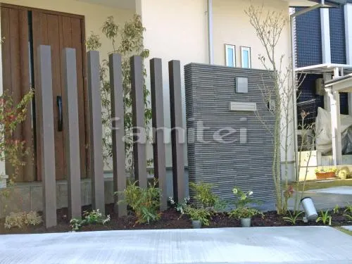 貝塚市 外構工事 玄関まわり アプローチ 門柱 角柱 ポスト 植栽 照明 駐車場ガレージまわり 土間コンクリート