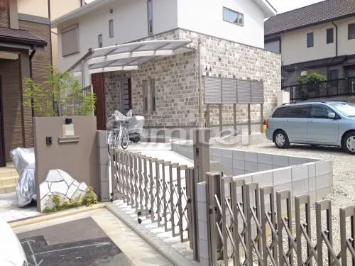 堺市東区 外構工事 機能門柱 伸縮門扉 玄関アプローチ 土間コンクリート ピンコロ石 玄関アプローチ一部 床石貼り カーポート スロープ バリアフリー 段差ステップ解消 手摺り(手すり) 目隠しフェンス塀