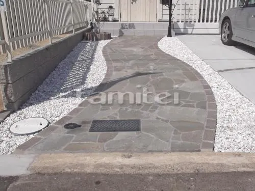 和泉市 外構工事 玄関アプローチ 機能門柱 シンボルツリー レンガ花壇 フル木製調自転車バイク屋根 駐車場ガレージ床 土間コンクリート 洋風目隠しフェンス塀 境界フェンス塀