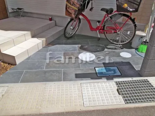 泉佐野市 外構工事 玄関まわり 門柱 照明 ポスト アプローチ 駐車場ガレージ床 土間コンクリート 伸縮目地 自転車バイク置き場 土間コンクリート 駐輪場 犬走り 防犯砂利敷き バラス砕石 防草シート加工