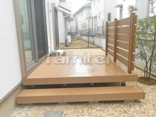 生駒市 リフォーム庭園工事 お庭リフォーム外構 人工木材ウッドデッキ LIXILリクシル 樹ら楽ステージ(きらら) 樹脂 TOEXトエックス 階段ステップ1段 デッキフェンス ボードラインフェンス シンボルツリー シマトネリコ 常緑樹 植栽 飛び石 床平板貼り ユニソン リビオ300角 シルバー 化粧砂利 久保田セメント アベニューストーン ラテイエロー