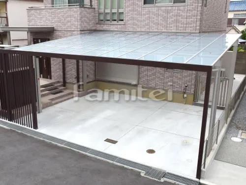 松原市 新築ハイクラス セミクローズ外構 モダン門柱 壁タイル貼り LIXILはるかべくん 細割ボーダー  ガラスブロック 郵便受けポスト レンガ花壇 ユニソンカルタブリック シンボルツリー シマトネリコ 玄関門扉 ジオーナSA型 玄関アプローチ 床タイル貼り カーポート YKKエフルージュ横3台 プラスG Gフレーム 物置ガーデンストレージ 目隠しフェンス塀 化粧ブロック ユニソン ジャスティ