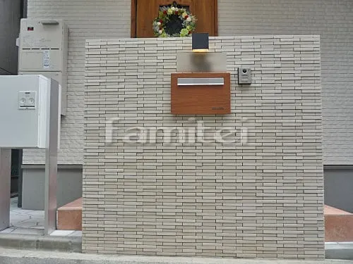 東大阪市 新築シンプル セミクローズ外構 門柱 ポスト 宅配ボックス シンボルツリー アプローチ 目隠しフェンス 忍び返し 電動シャッター 犬走り