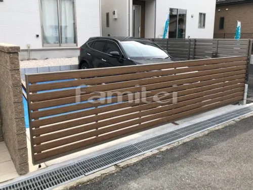 高槻市 新築ベーシック クローズ外構 玄関門扉 LIXILリクシル 開き門扉 木製調AA TS1型 12-05・09 親子両開き 化粧ブロック門柱 門袖 ユニソン シャモティ電動跳ね上げ式門扉 ワイドオーバードアS3型 横2台用 アップゲート