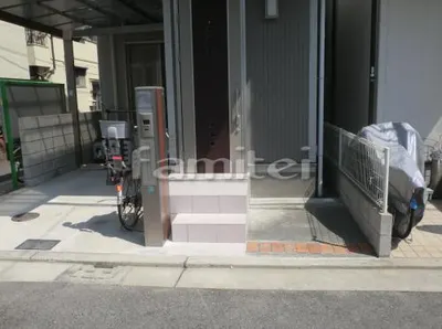 01 門まわりリフォーム　アプローチ縮小　コンクリート土間　機能門柱移設