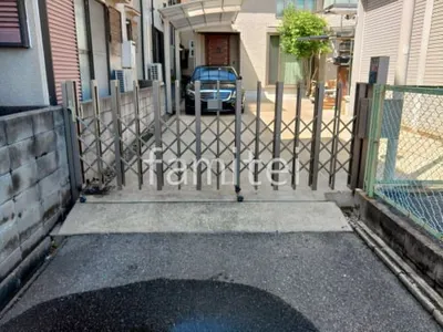 既存伸縮門扉移設