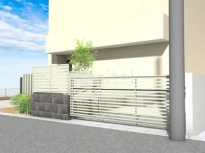 跳ね上げゲートと目隠しフェンスでセキュリティを強化した車庫まわりリフォーム