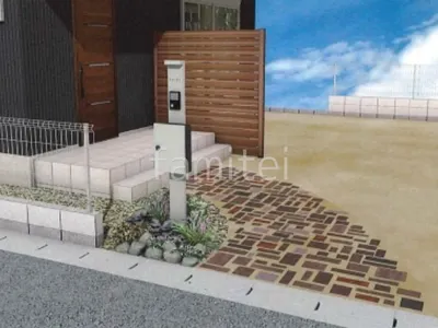 レンガの曲線アプローチが優しい印象の外構リフォーム工事