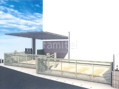 跳ね上げゲートと角柱で防犯を強化した車庫まわりリフォーム