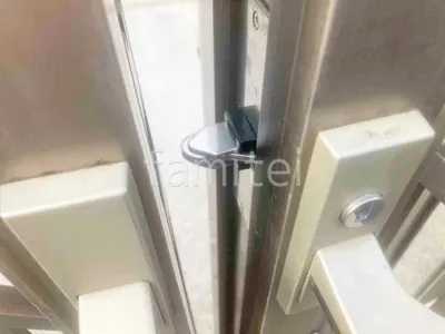 既存伸縮門扉補修