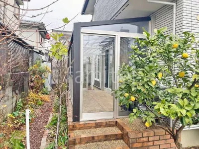 引き戸 樹脂デッキ サンルーム（テラス囲い） YKKAP 木製調 ソラリアF フラット屋根